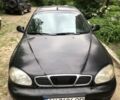 Чорний Деу Ланос, об'ємом двигуна 1.5 л та пробігом 100 тис. км за 2000 $, фото 1 на Automoto.ua