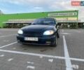 Чорний Деу Ланос, об'ємом двигуна 1.5 л та пробігом 290 тис. км за 2000 $, фото 1 на Automoto.ua