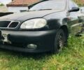 Черный Дэу Ланос, объемом двигателя 1.5 л и пробегом 270 тыс. км за 2700 $, фото 1 на Automoto.ua