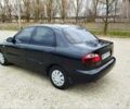 Черный Дэу Ланос, объемом двигателя 1.5 л и пробегом 112 тыс. км за 1100 $, фото 1 на Automoto.ua