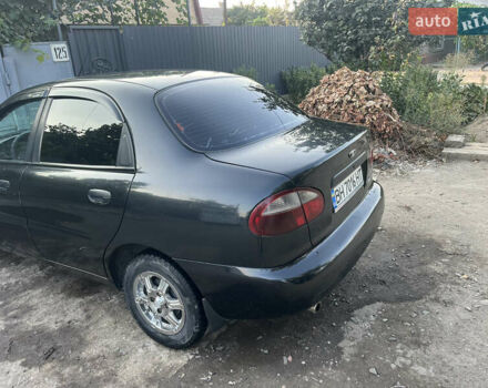 Черный Дэу Ланос, объемом двигателя 1.5 л и пробегом 160 тыс. км за 2800 $, фото 4 на Automoto.ua