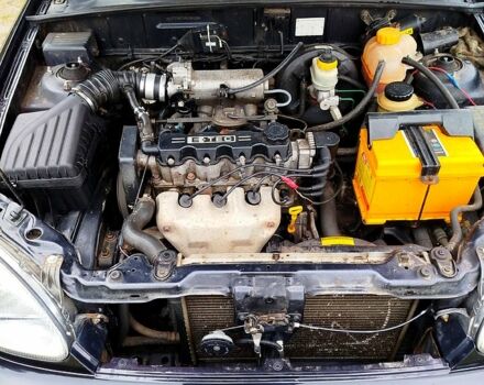 Черный Дэу Ланос, объемом двигателя 1.5 л и пробегом 197 тыс. км за 3150 $, фото 2 на Automoto.ua