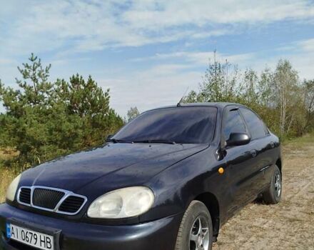 Черный Дэу Ланос, объемом двигателя 1.5 л и пробегом 201 тыс. км за 2600 $, фото 1 на Automoto.ua