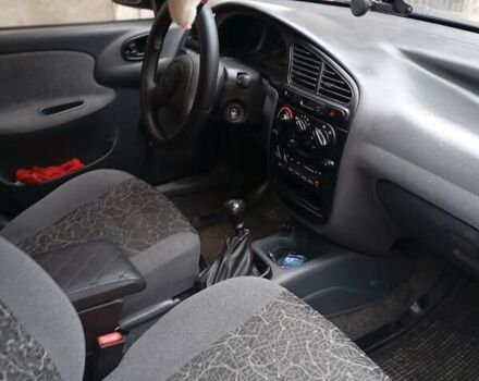 Черный Дэу Ланос, объемом двигателя 1.5 л и пробегом 272 тыс. км за 2000 $, фото 4 на Automoto.ua