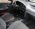 Черный Дэу Ланос, объемом двигателя 1.5 л и пробегом 272 тыс. км за 2000 $, фото 4 на Automoto.ua