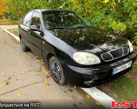 Черный Дэу Ланос, объемом двигателя 1.5 л и пробегом 256 тыс. км за 2600 $, фото 5 на Automoto.ua