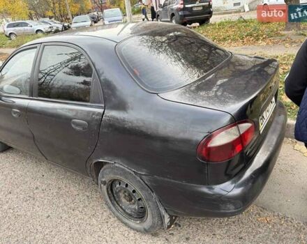 Черный Дэу Ланос, объемом двигателя 1.5 л и пробегом 100 тыс. км за 900 $, фото 17 на Automoto.ua