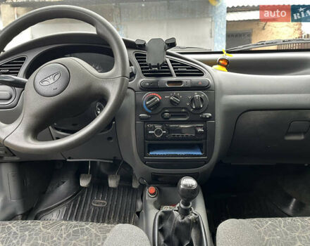 Черный Дэу Ланос, объемом двигателя 1.5 л и пробегом 140 тыс. км за 2500 $, фото 19 на Automoto.ua