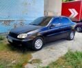 Черный Дэу Ланос, объемом двигателя 1.5 л и пробегом 370 тыс. км за 2300 $, фото 1 на Automoto.ua