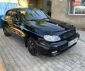 Черный Дэу Ланос, объемом двигателя 1.5 л и пробегом 230 тыс. км за 2450 $, фото 1 на Automoto.ua