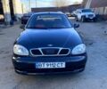 Черный Дэу Ланос, объемом двигателя 1.5 л и пробегом 197 тыс. км за 1600 $, фото 1 на Automoto.ua