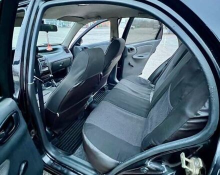 Черный Дэу Ланос, объемом двигателя 1.5 л и пробегом 653 тыс. км за 2199 $, фото 11 на Automoto.ua