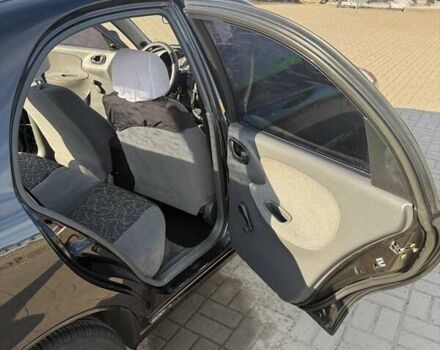 Черный Дэу Ланос, объемом двигателя 1.5 л и пробегом 163 тыс. км за 2900 $, фото 18 на Automoto.ua