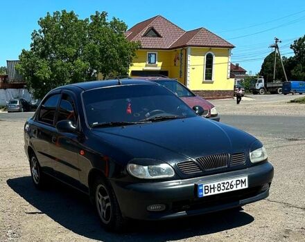 Черный Дэу Ланос, объемом двигателя 1.5 л и пробегом 123 тыс. км за 2200 $, фото 5 на Automoto.ua