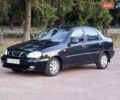 Черный Дэу Ланос, объемом двигателя 1.5 л и пробегом 260 тыс. км за 1750 $, фото 1 на Automoto.ua