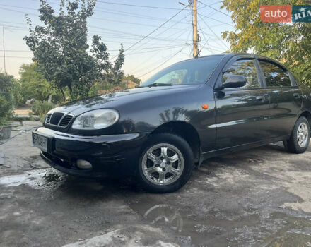 Черный Дэу Ланос, объемом двигателя 1.5 л и пробегом 160 тыс. км за 2800 $, фото 2 на Automoto.ua