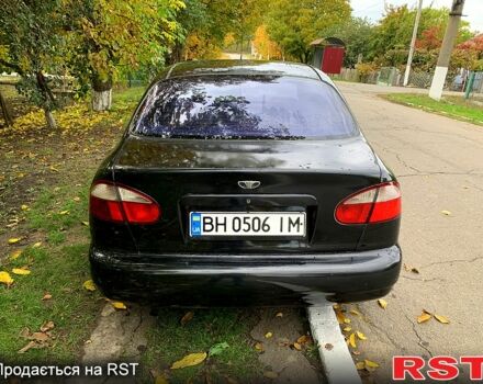 Черный Дэу Ланос, объемом двигателя 1.5 л и пробегом 256 тыс. км за 2600 $, фото 3 на Automoto.ua