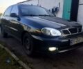 Чорний Деу Ланос, об'ємом двигуна 1.5 л та пробігом 162 тис. км за 2000 $, фото 1 на Automoto.ua