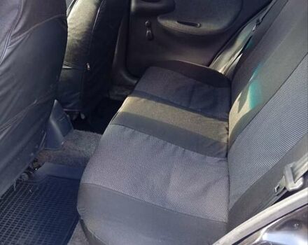 Деу Ланос 2006 у Буче на Automoto.ua Чорний Деу Ланос, об'ємом двигуна 1.5 л та пробігом 410 тис. км за 2250 $, фото 12 на Automoto.ua