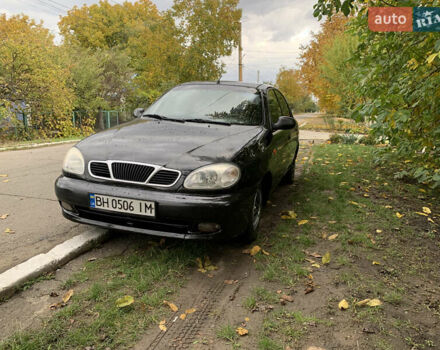 Черный Дэу Ланос, объемом двигателя 1.5 л и пробегом 263 тыс. км за 1830 $, фото 1 на Automoto.ua