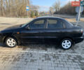 Черный Дэу Ланос, объемом двигателя 1.5 л и пробегом 322 тыс. км за 1800 $, фото 3 на Automoto.ua