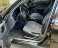 Черный Дэу Ланос, объемом двигателя 1.5 л и пробегом 370 тыс. км за 2300 $, фото 4 на Automoto.ua