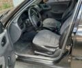 Черный Дэу Ланос, объемом двигателя 1.5 л и пробегом 371 тыс. км за 2100 $, фото 1 на Automoto.ua