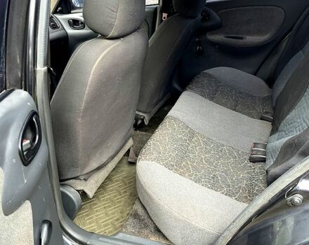 Черный Дэу Ланос, объемом двигателя 1.5 л и пробегом 250 тыс. км за 1400 $, фото 5 на Automoto.ua