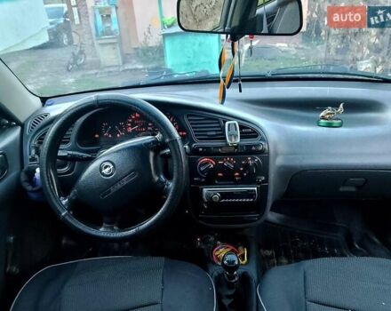 Черный Дэу Ланос, объемом двигателя 1.5 л и пробегом 256 тыс. км за 1850 $, фото 2 на Automoto.ua