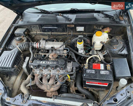 Черный Дэу Ланос, объемом двигателя 1.5 л и пробегом 231 тыс. км за 1750 $, фото 4 на Automoto.ua