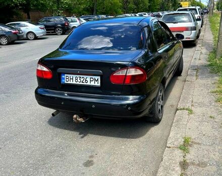 Черный Дэу Ланос, объемом двигателя 1.5 л и пробегом 123 тыс. км за 2200 $, фото 3 на Automoto.ua