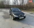 Черный Дэу Ланос, объемом двигателя 1.5 л и пробегом 300 тыс. км за 1650 $, фото 3 на Automoto.ua