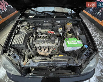 Черный Дэу Ланос, объемом двигателя 1.5 л и пробегом 145 тыс. км за 1799 $, фото 2 на Automoto.ua