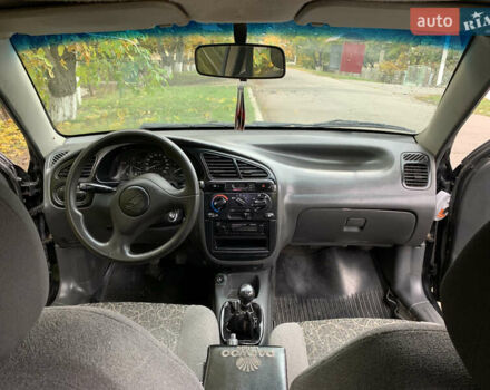 Черный Дэу Ланос, объемом двигателя 1.5 л и пробегом 263 тыс. км за 1830 $, фото 9 на Automoto.ua