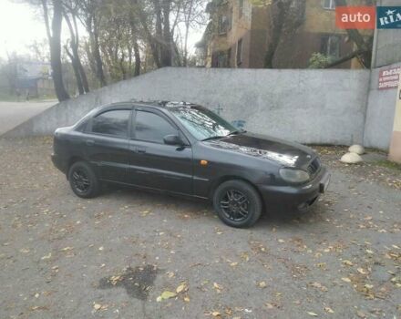 Черный Дэу Ланос, объемом двигателя 1.5 л и пробегом 200 тыс. км за 1550 $, фото 1 на Automoto.ua