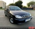 Черный Дэу Ланос, объемом двигателя 1.5 л и пробегом 116 тыс. км за 1999 $, фото 1 на Automoto.ua