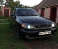 Чорний Деу Ланос, об'ємом двигуна 1.5 л та пробігом 223 тис. км за 2228 $, фото 1 на Automoto.ua