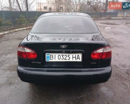 Черный Дэу Ланос, объемом двигателя 1.35 л и пробегом 122 тыс. км за 1699 $, фото 5 на Automoto.ua