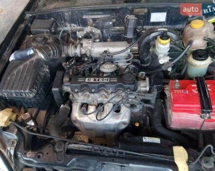 Черный Дэу Ланос, объемом двигателя 1.5 л и пробегом 256 тыс. км за 1850 $, фото 3 на Automoto.ua