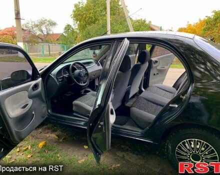 Черный Дэу Ланос, объемом двигателя 1.5 л и пробегом 256 тыс. км за 2600 $, фото 9 на Automoto.ua
