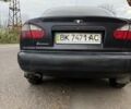 Черный Дэу Ланос, объемом двигателя 1.5 л и пробегом 100 тыс. км за 900 $, фото 19 на Automoto.ua