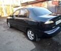 Черный Дэу Ланос, объемом двигателя 1.5 л и пробегом 231 тыс. км за 1999 $, фото 4 на Automoto.ua