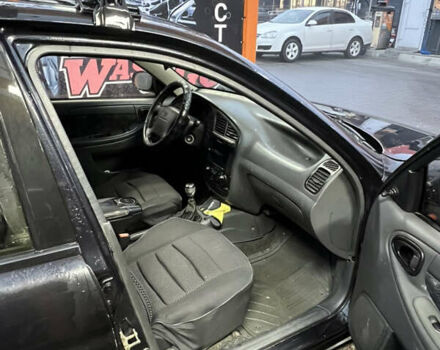 Черный Дэу Ланос, объемом двигателя 1.5 л и пробегом 145 тыс. км за 1799 $, фото 14 на Automoto.ua