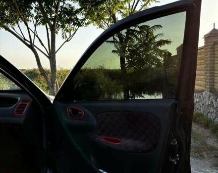 Деу Ланос 2006 у Новомосковске на Automoto.ua Чорний Деу Ланос, об'ємом двигуна 1.5 л та пробігом 328 тис. км за 1800 $, фото 9 на Automoto.ua