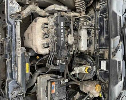 Черный Дэу Ланос, объемом двигателя 1.5 л и пробегом 100 тыс. км за 900 $, фото 6 на Automoto.ua