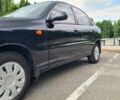 Черный Дэу Ланос, объемом двигателя 1.5 л и пробегом 160 тыс. км за 2500 $, фото 6 на Automoto.ua
