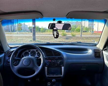 Черный Дэу Ланос, объемом двигателя 1.5 л и пробегом 310 тыс. км за 2500 $, фото 1 на Automoto.ua