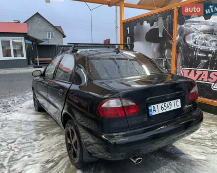 Черный Дэу Ланос, объемом двигателя 1.5 л и пробегом 145 тыс. км за 1799 $, фото 1 на Automoto.ua