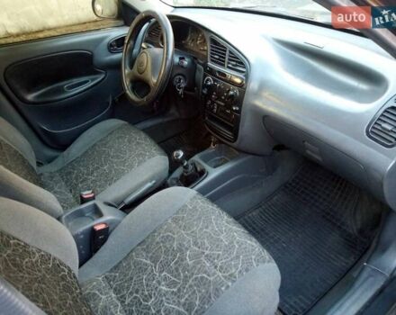 Черный Дэу Ланос, объемом двигателя 1.5 л и пробегом 231 тыс. км за 1999 $, фото 9 на Automoto.ua