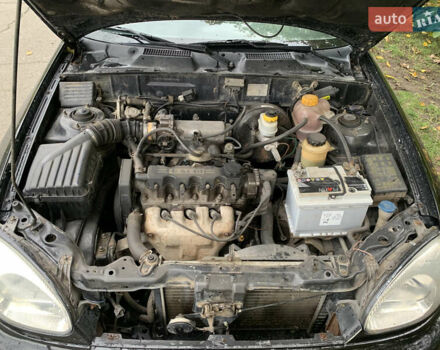 Черный Дэу Ланос, объемом двигателя 1.5 л и пробегом 263 тыс. км за 1830 $, фото 10 на Automoto.ua